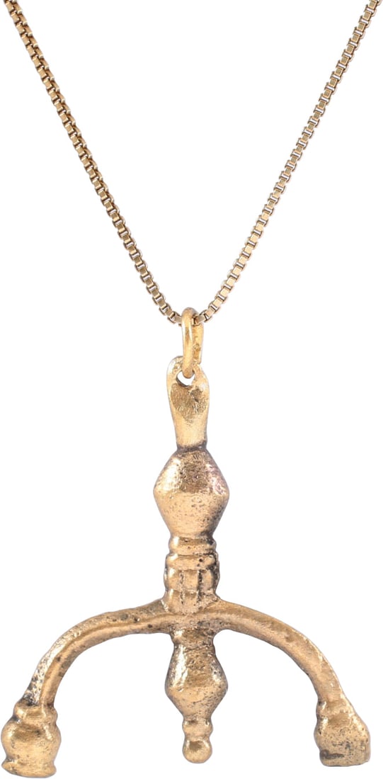 FINE VIKING LUNAR PENDANT NECKLACE C.900-1000 AD: Gilt bronze. As expert navigators, the constellations signified mystery and power to Vikings. Lunar pendants were worn as pectorals as well as suspended from belts, other clothing and horse harnesses.