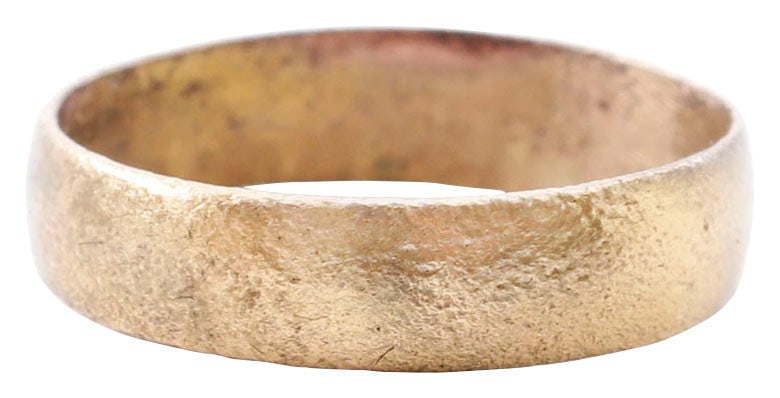 ANCIENT VIKING WEDDING RING, C.850-1050 AD, SIZE 9 1/4: Broad, rounded face band, 4.4 to 4.9mm width. Vikings exchanged rings on the pommel of the groom’s sword. Surface textured from burial. Professionally refurbished with the 24karat gold surface