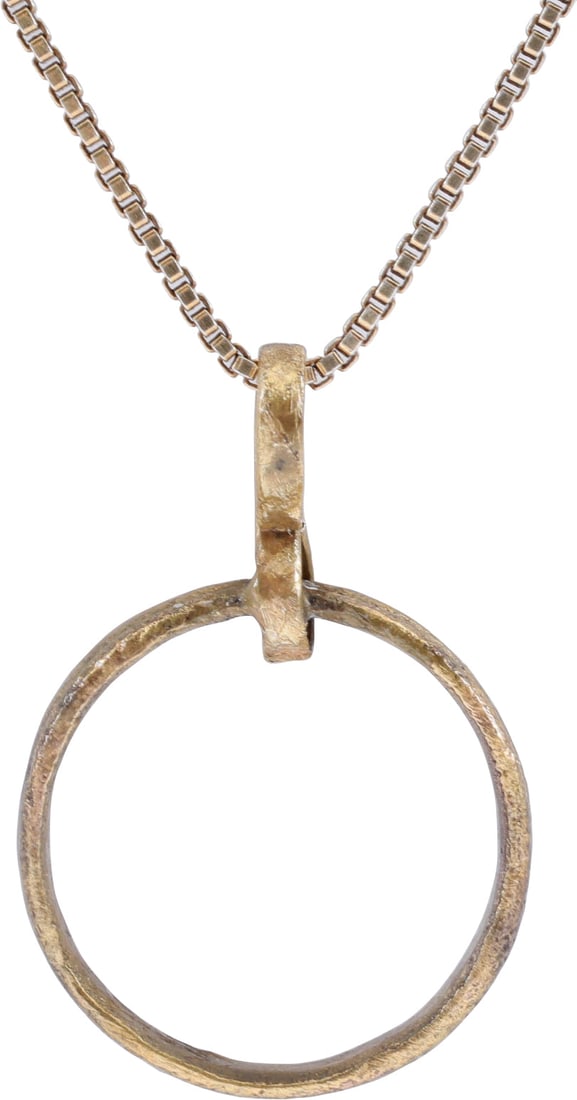 VIKING BEARD RING NECKLACE, 9TH-11TH CENTURY: Round with off set banded face, 0.53” inside diameter and 0.60” outside. The use of beard rings by Vikings is well documented though very few genuine examples survive. Professionally