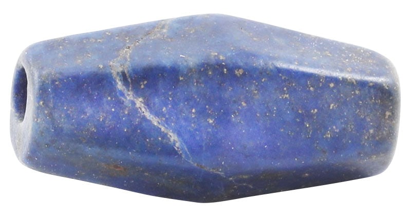 VIKING LAPIS LAZULI BEAD 850-1000 AD: Polished stone, meticulously worked and polished to a hexagonal section, tapered from the middle to the ends. 7.1mm width. 15.8mm length, (0.62”). One of a small group from a larger necklace. Co