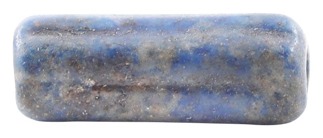 VIKING LAPUS LAZULI BEAD, 850-1000 AD: Polished stone, meticulously worked and polished to a ribbed cylindrical form. 5.2mm diameter, 13.5mm (0.54”) length. One of a group of seven from a larger necklace. •Celtic Roman Viking