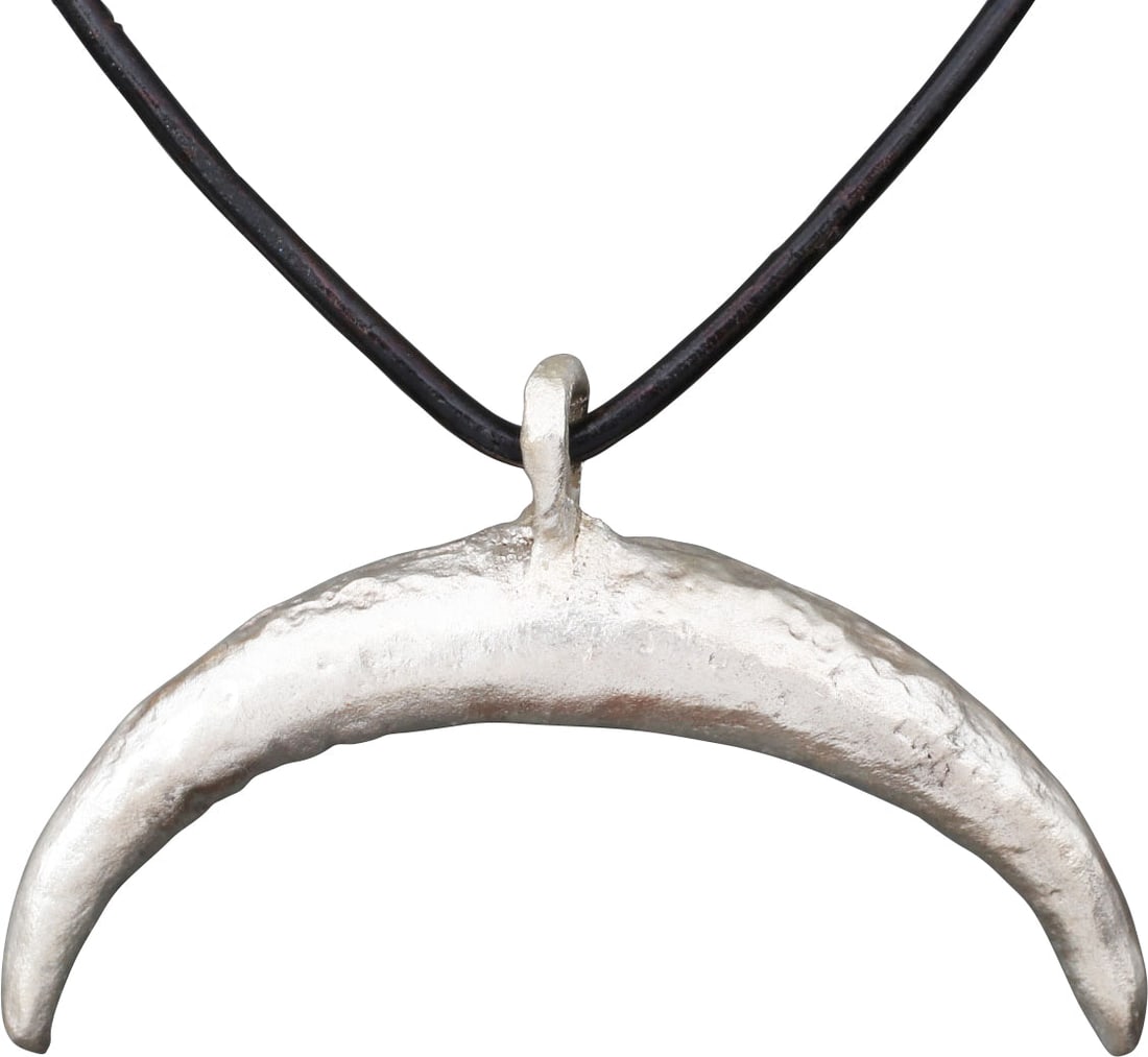 MASSIVE VIKING LUNAR AMULET: Silvered bronze, over 2 ¼” (2.28”) width of heavy crescent form. As expert navigators, the constellations signified mystery and power to Vikings. The Moon was personified as Mani,