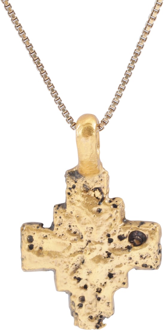 EUROPEAN PILGRIMS CROSS, 7th-10th CENTURY: Gilt bronze. Just over 1” (1.09”) total height. Broad beams with the cross beam centered. Square expansion at the junction. Centrally incised with a cross and saltire somewhat obscured by 