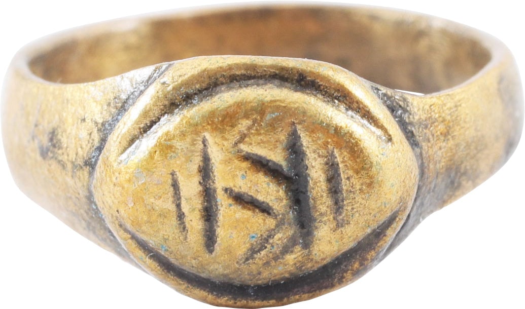 ROMAN MYSTICAL RING, 3RD-5TH CENTURY AD, SIZE 5 1/2: Gilt bronze. Size 5 1/2 with 3.4mm well rounded face band. Raised stepped lenticular bezel with a figure or cipher flanked by uprights, probably a clandestine representation of the Zoroastrian fire