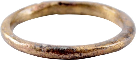 RARE VIKING WARRIOR’S BEARD RING, 9TH-11TH CENTURY: Circular, gilt bronze. Deeply rounded face with flat sides. Cylindrical inside. 0.51" inside diameter, just over 1/2" . The use of beard rings by Vikings is well documented though very few genuine