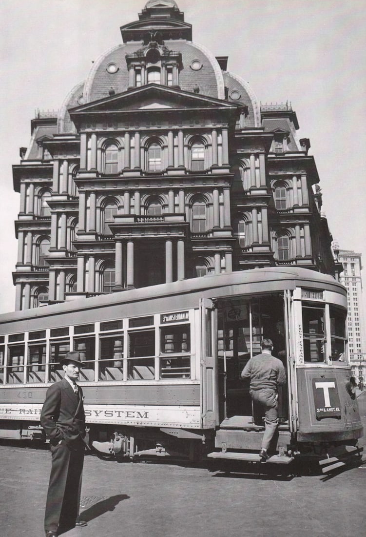 BERENICE ABBOTT - Old Post office with Trolley Car, NYC: Artist: BERENICE ABBOTT Print Title: Old Post office with Trolley Car, NYC Medium: Photo-lithograph Printed in: Japan, 1982 Image Size: approx. 12.5 x 9” Berenice Abbott (1898 – 1991),was