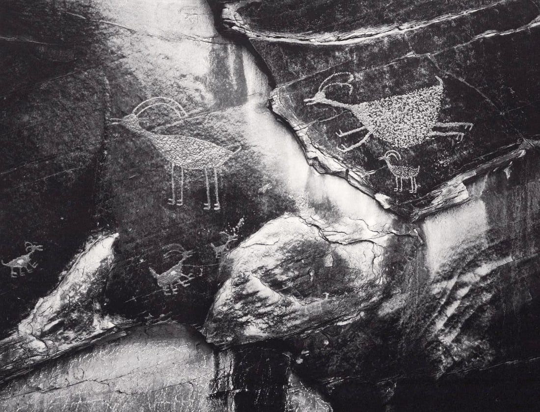 ANSEL ADAMS - Petroglyphs, Monument Valley, Utah, 1958: Artist: ANSEL ADAMS Print Title: Petroglyphs, Monument Valley, Utah, 1958 Medium: Photolithograph Printed 1980so in the US Image Size: approx. 10 x 13” Ansel Easton Adams (1902 –