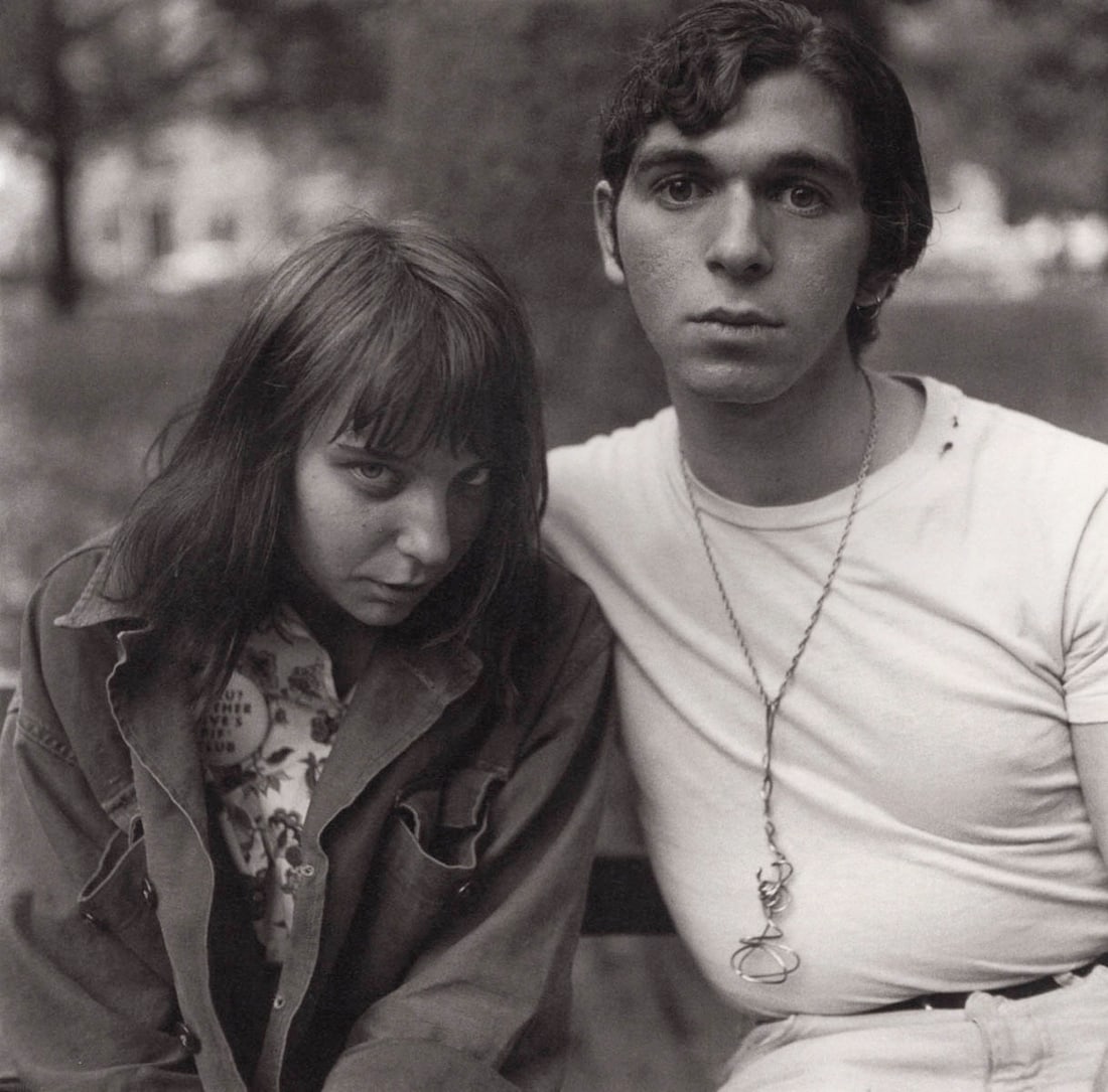 DIANE ARBUS - Girl and boy, Wash. SQ. Park, NYC, 1965: Artist: DIANE ARBUS Print Title: Girl and boy, Wash. SQ. Park, NYC, 1965 Medium: Duotone Print Printed 2000’s in Germany Image size (inches) approx. 8 x 8” Diane Arbus (1923