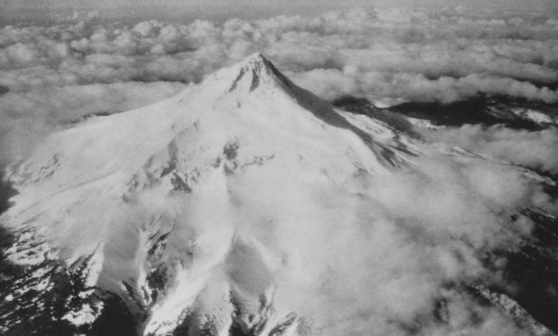 FAIRCHILD AERIAL SURVEYS INC. - Mt. Hood, Ore. c. 1930s: Artist: FAIRCHILD AERIAL SURVEYS INC. Print Title: Mt. Hood, Ore. Medium: Sheet-fed Gravure Printing Date: 1930's Printed in the USA Image Size approx.: 5.25 x 8.25 inches COA Included Reserve: