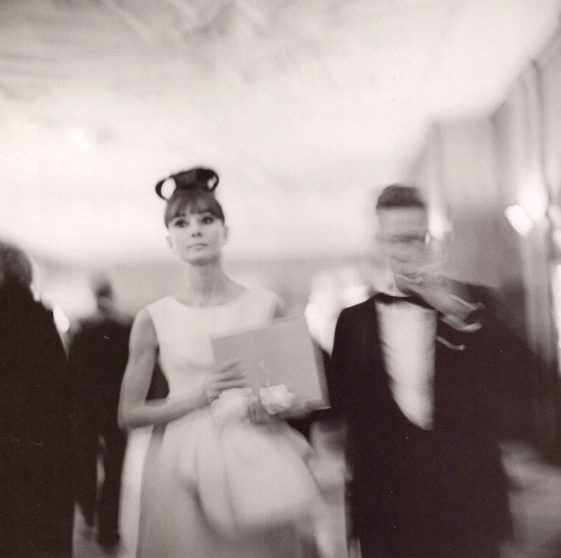 VIVIAN MAIER - Audrey Hepburn at premiere of My Fair Lady, Chicago, 1964: Artist: VIVIAN MAIER Print Title: Audrey Hepburn at premiere of My Fair Lady, Chicago, 1964 Medium:Color Photolithograph Printed 2010’s in Malaysia Image size (inches) approx. 8.5 x 8.5”