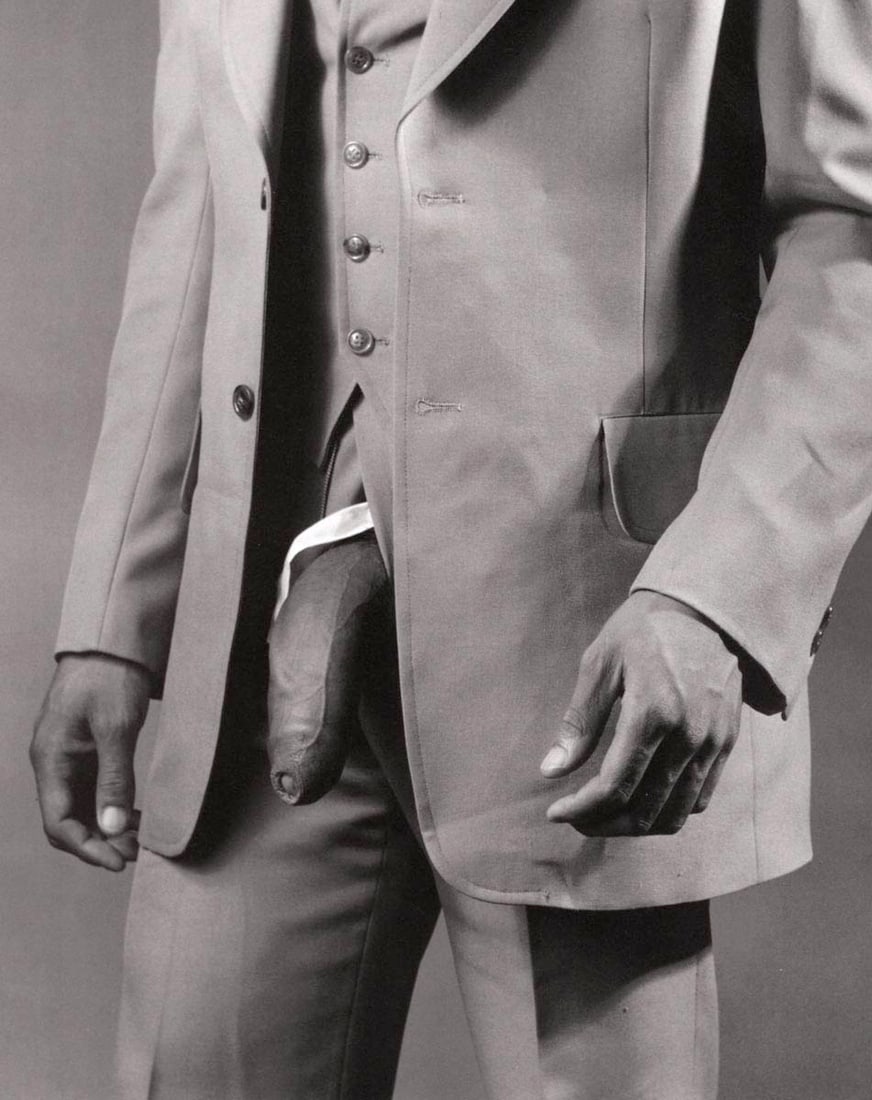 MAPPLETHORPE - Man in Polyester Suit, 1980: Artist: MAPPLETHORPE Print Title:Man in Polyester Suit, 1980 Medium: Duotone Print Printed 1990s in the Italy Image size (inches) approx. 10 x 8” Robert Mapplethorpe was an American