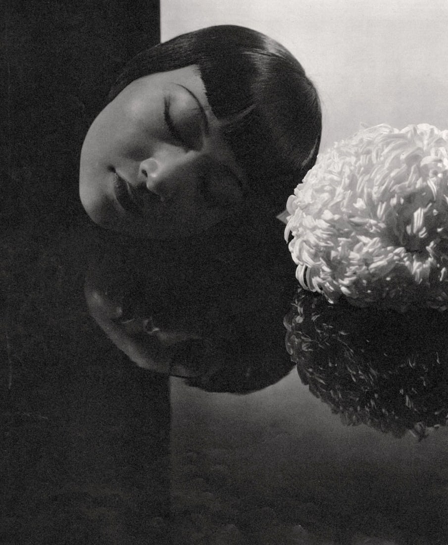 EDWARD STEICHEN - Anna May Wong, NY, 1930: Artist: EDWARD STEICHEN Print Title: Anna May Wong, NY, 1930 Medium: Sheet-fed Gravure Printing Date: 1960's Printed in Switzerland Image Size approx: 9.5 x 7.5 inches Edward Jean Steichen (1879-1973)