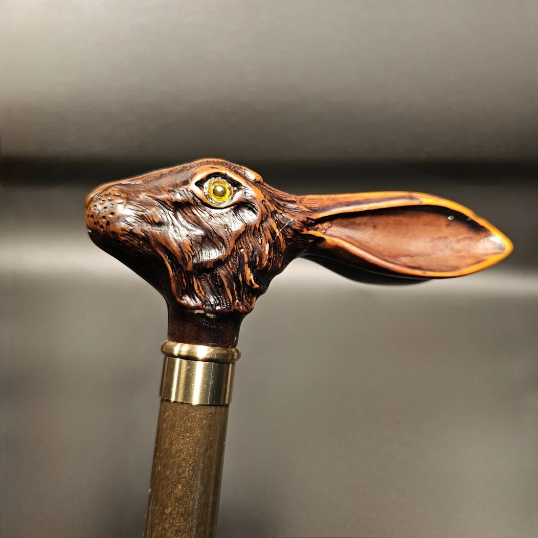 36" Jack Rabbit Walking Stick Cane: 36" Long 3/4" shaft Introducing Jack, our beloved reproduction Jack Rabbit walking cane with lively glass eyes, originating from Italy. Crafted from robust cellulose acetate, this handle sits atop a