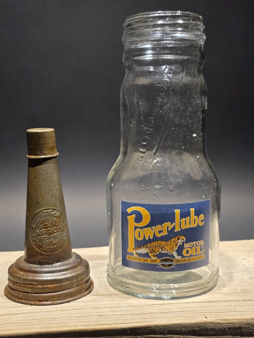 1930s Style Glass Power Lube Oil Bottle w Spout: 3.5 W x 17 H Wonderful vintage style reproduction Power-lube motor oil bottle with its spout. The Power-lube decal with a tiger logo is indicative of the 1930s. Such a neat reproduction glass oil