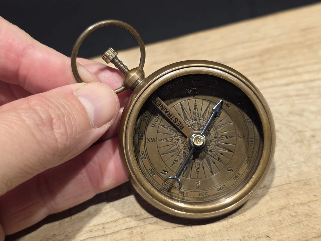 Solid Brass Pocket Compass: Vintage Style Brass Pocket Compass - Nautical Reproduction Find your way with style. This pocket compass features a classic antiqued brass finish, making it a perfect addition for collectors,
