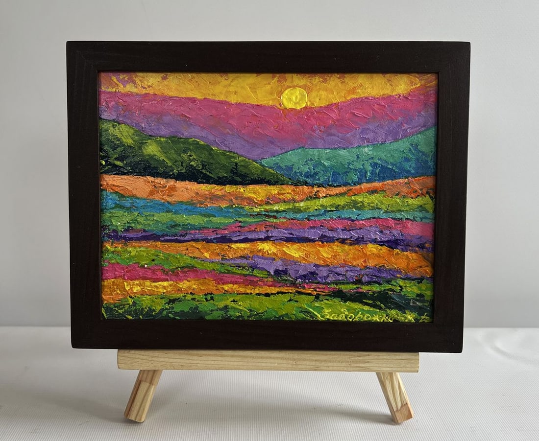 Oil painting The sun in the embrace of the mountain V. Zadorozhnya: NoAAA4560The painting "The Sun in the Embrace of the Mountain" presents a breathtaking landscape where the sun gently nestles between the peaks, casting its golden light across the vibrant scenery. Th