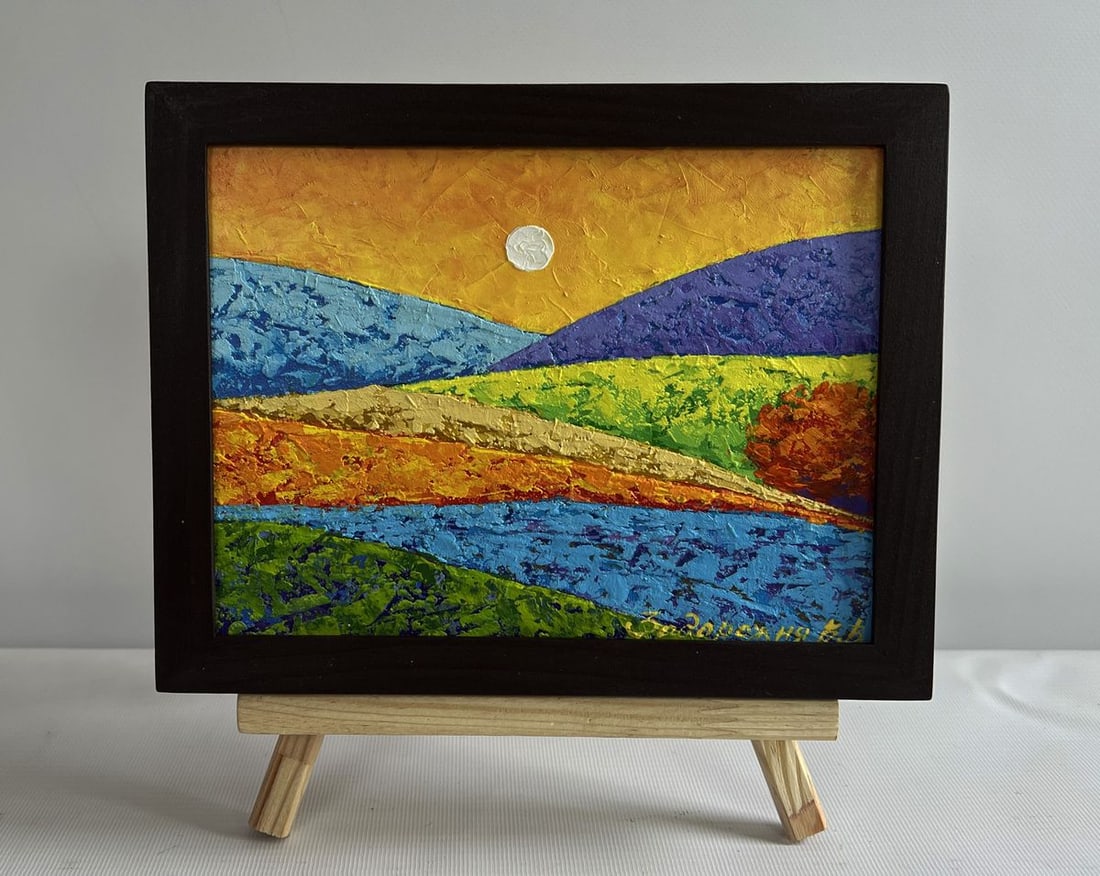 Oil painting Yellow rays of sunset V. Zadorozhnya: NoAAA4563The painting "Yellow Rays of Sunset" captures the fleeting beauty of the evening as the sun casts its golden glow across a vast, rolling landscape. With a bold use of color and expressive bru