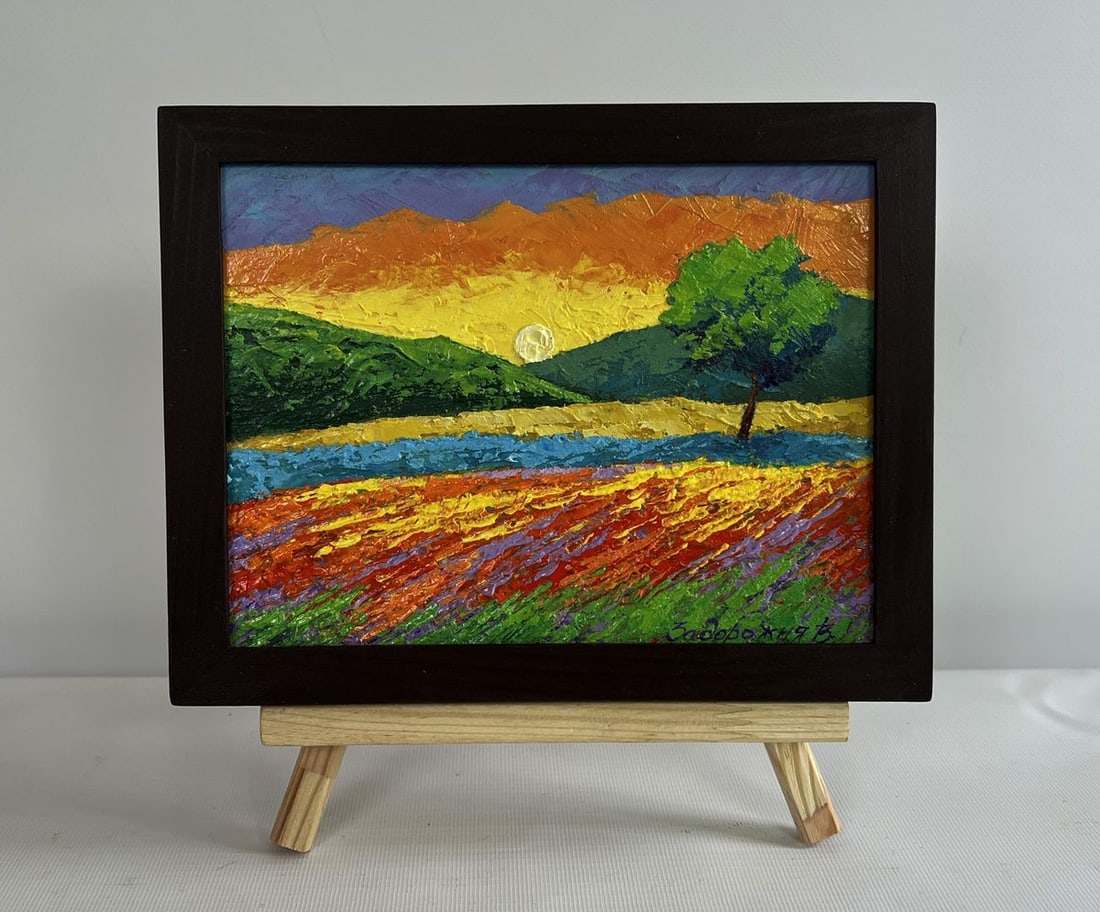Oil painting A light breeze in the evening V. Zadorozhnya: NoAAA4600The painting "A Light Breeze in the Evening" captures the tranquil beauty of a summer landscape bathed in the golden light of the setting sun. The artist employs a rich palette of warm and