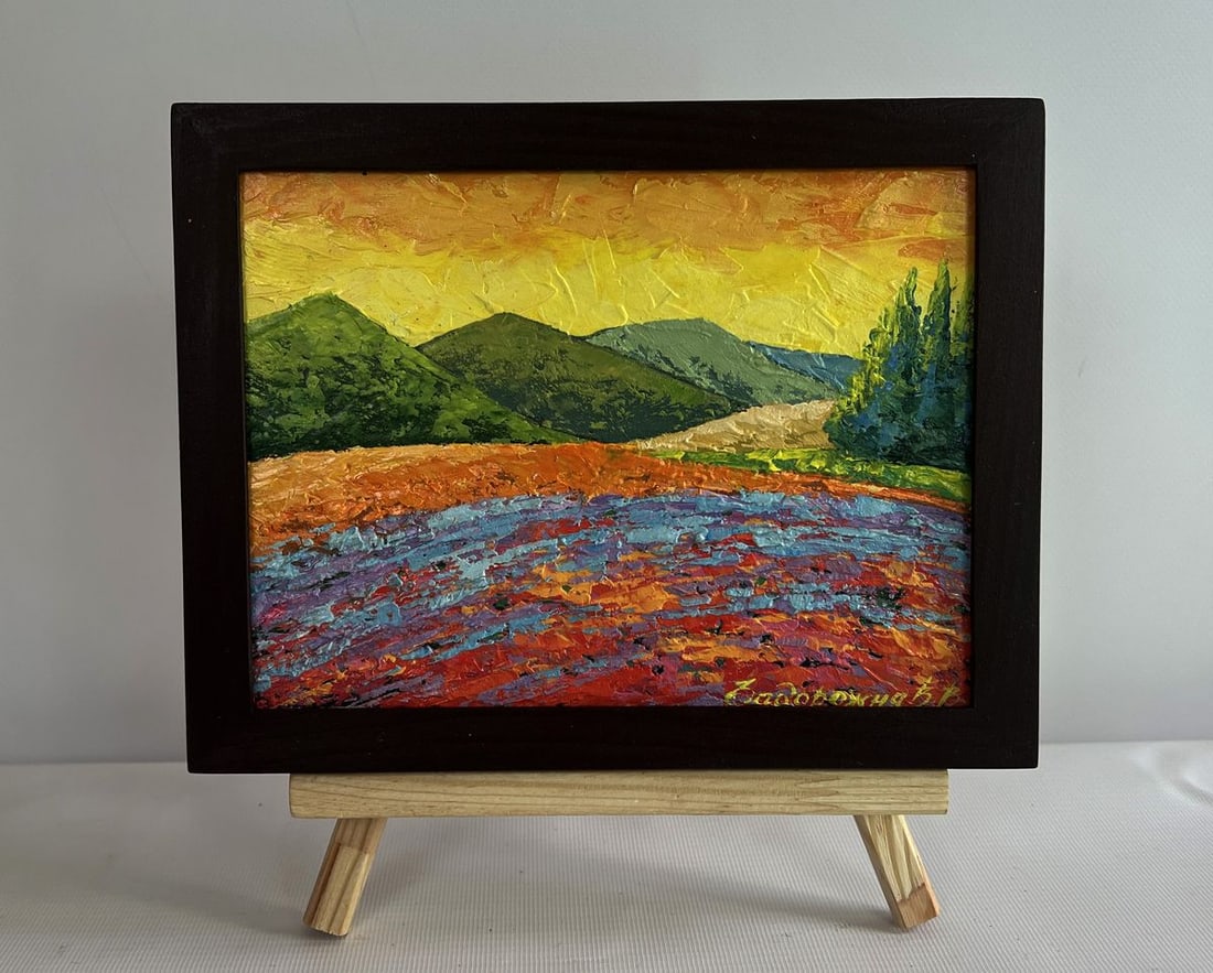 Oil painting Dance of yellow colors in the meadows V. Zadorozhnya: NoAAA4607The painting "Dance of Yellow Colors in the Meadows" is a vibrant and expressive oil painting on cardboard that captures the essence of a sunset over rolling fields and distant mountains. The