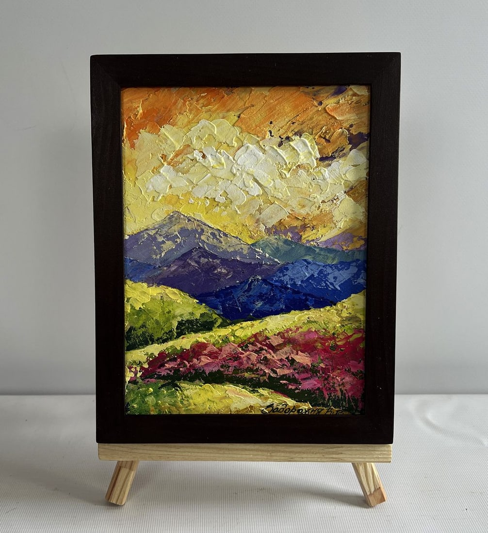 Oil painting Yellow clouds in a mountain valley V. Zadorozhnya: NoAAA4619The oil painting on cardboard titled "Yellow Clouds in a Mountain Valley" captures a mesmerizing and dynamic landscape, where the majesty of towering mountains meets the delicate beauty of a