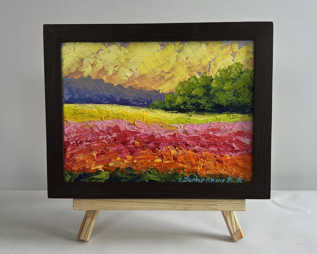 Oil painting Sunset among forest and fields V. Zadorozhnya: NoAAA4627The oil painting on cardboard titled "Sunset Among Forest and Fields" captures a breathtaking moment of nature's transition as the sun dips below the horizon. With a striking combination of w