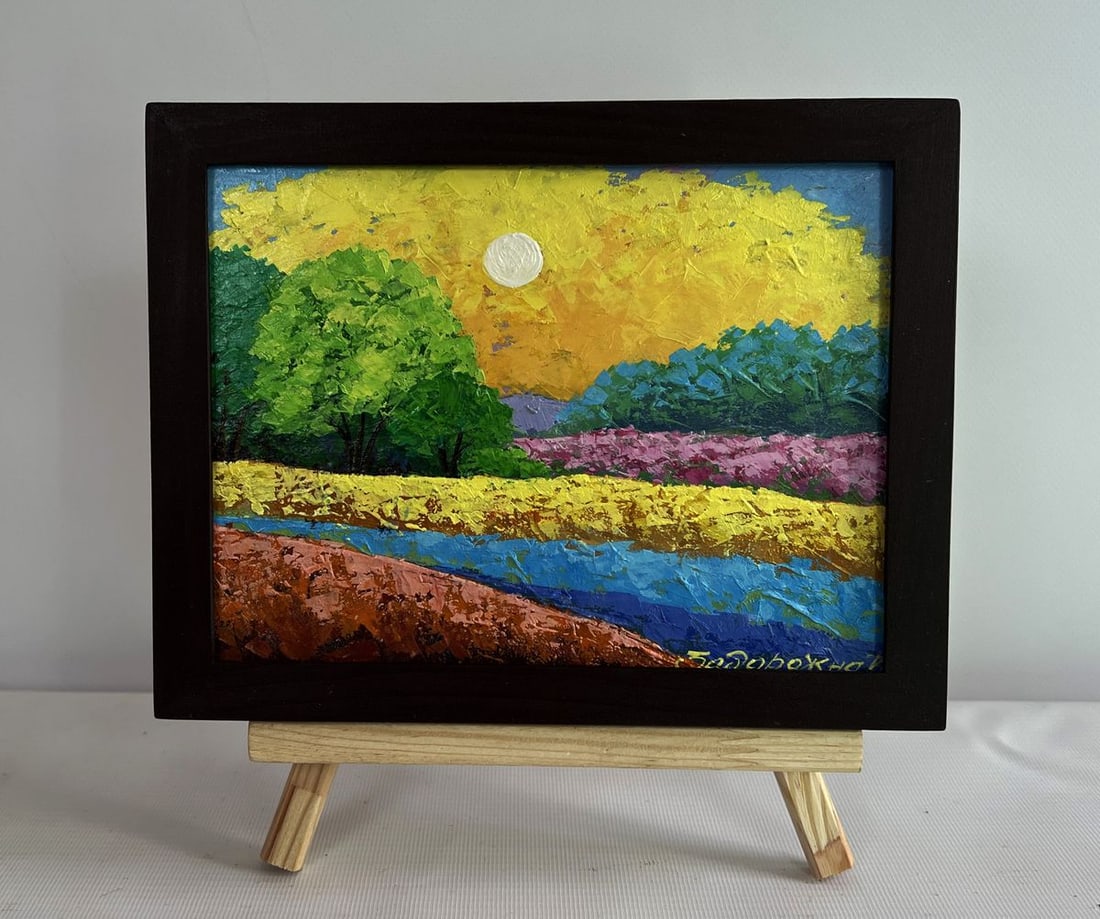 Oil painting Warm summer evening in the field V. Zadorozhnya: NoAAA4638The oil painting on cardboard titled "Warm Summer Evening in the Field" captures the tranquil and golden essence of a serene countryside at dusk. The artist masterfully employs a vibrant