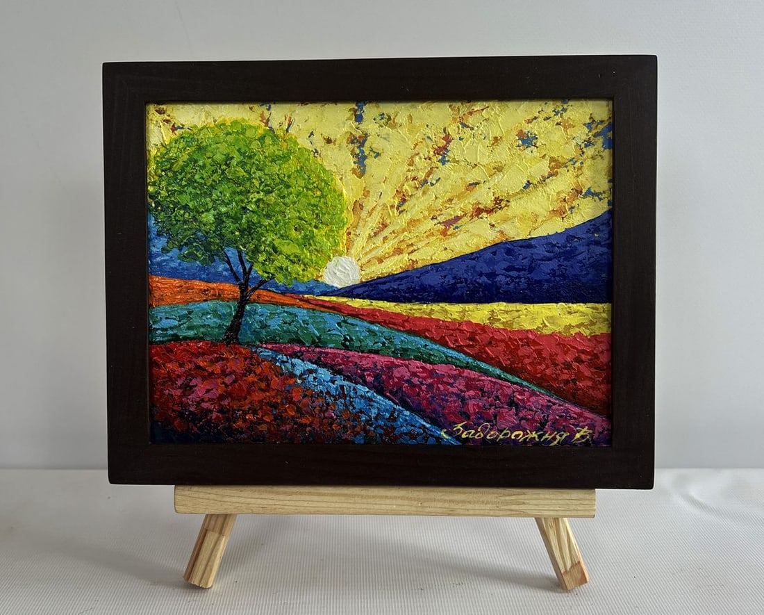 Oil painting In the field watching the sunset V. Zadorozhnya: NoAAA4647The oil painting on cardboard titled "In the Field Watching the Sunset" captures a moment of profound serenity and natural beauty as the golden sun sets behind the rolling hills. The