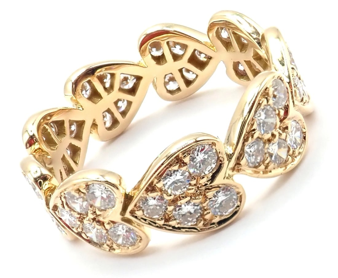 Authentic! Cartier 18k Yellow Gold Diamond Heart Eternity Band Ring Size 7.25: Authentic! Cartier 18k Yellow Gold Diamond Heart Eternity Band Ring Size 7.25 About This Piece: This ring comes with service paper from a Cartier store in NYC. Metal: 18k Yellow Gold Size: Width: Euro