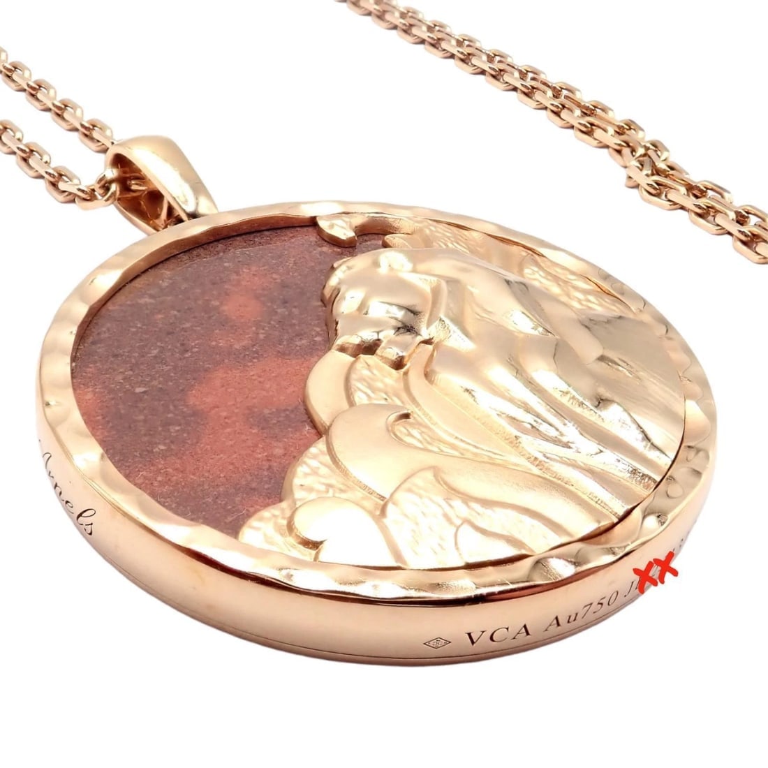 Van Cleef & Arpels Zodiaque 18k Rose Gold Leo Pendant Red Jasper Necklace + Cert: Van Cleef & Arpels Zodiaque 18k Rose Gold Leo Pendant Red Jasper Necklace + Cert About This Piece: The Van Cleef & Arpels Zodiaque necklace is a distinguished piece, artfully crafted from 18k rose gol