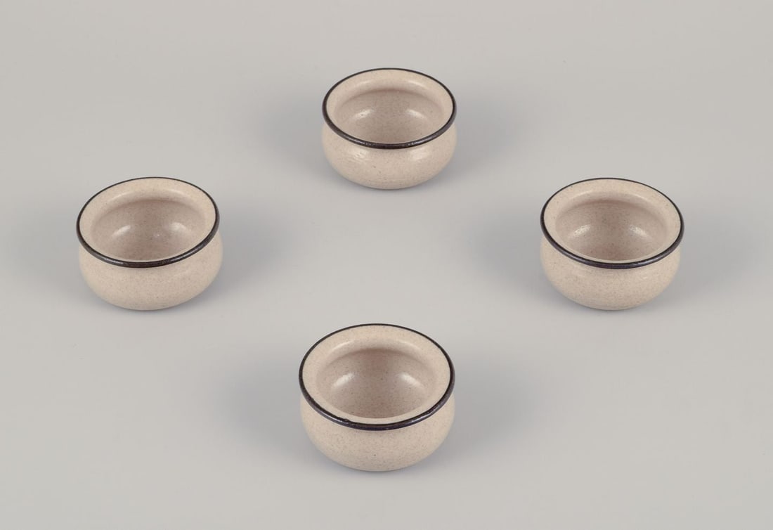 Kähler, Denmark. Four small ceramic bowls glazed in sandy tones. Ca. 1970: Title: Kähler, Denmark. Four small ceramic bowls glazed in sandy tones. Ca. 1970 Description: Kähler. Four small ceramic bowls. Glaze in sandy tones with a black edge. Approximately 1970.