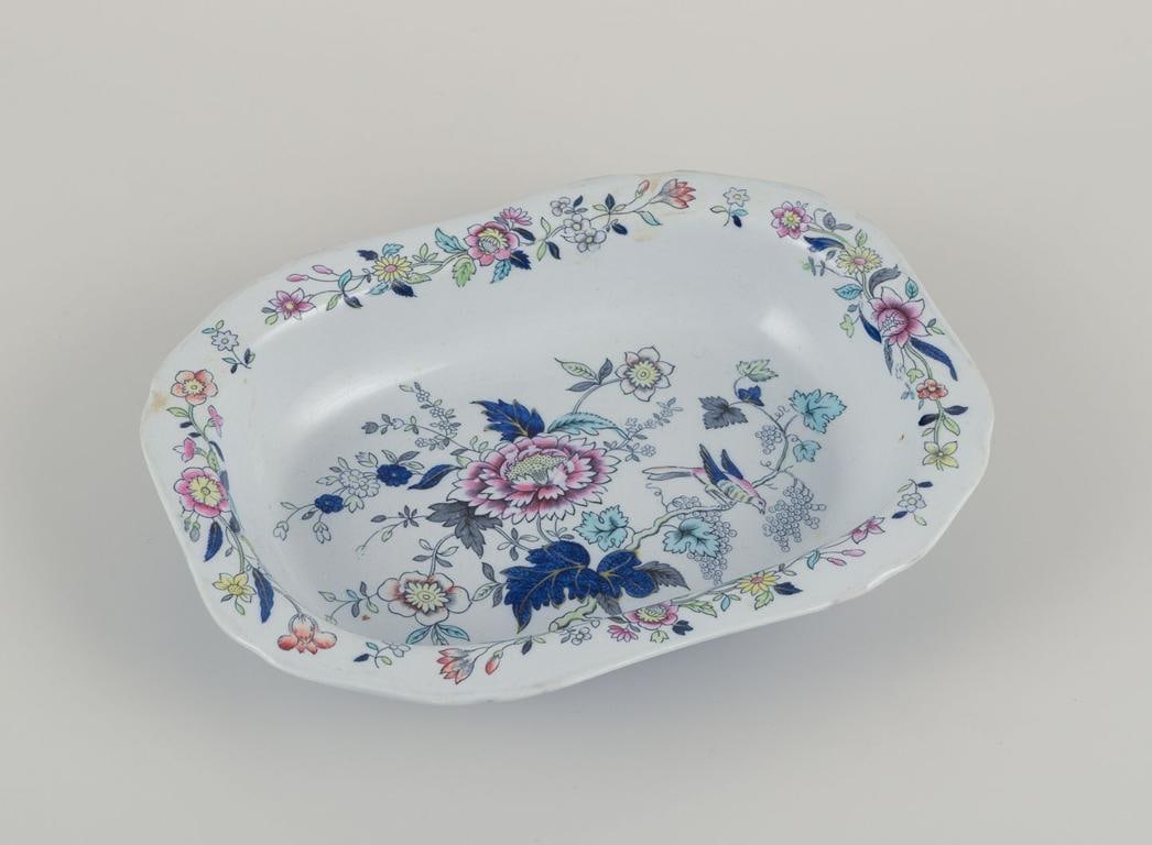 Copeland Spode, England. Set of oval dish and bowl in faience with flower and bird motifs. Approx. - 3