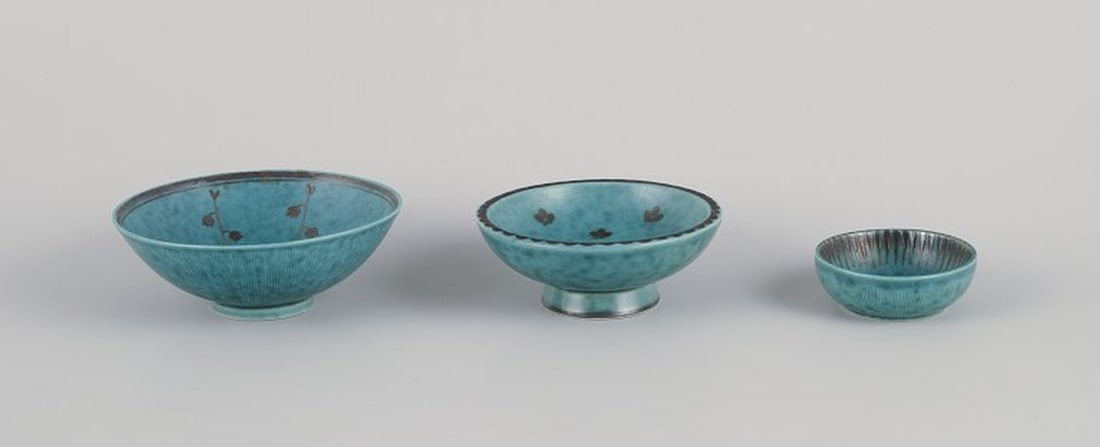 Wilhelm Kåge for Gustavsberg, Sweden. Three small ceramic bowls from the 'Argenta' series. Mid: Title: Wilhelm Kåge for Gustavsberg, Sweden. Three small ceramic bowls from the 'Argenta' series. Mid 20th century. Description: Wilhelm Kåge for Gustavsberg, Sweden. Three small ceramic bow