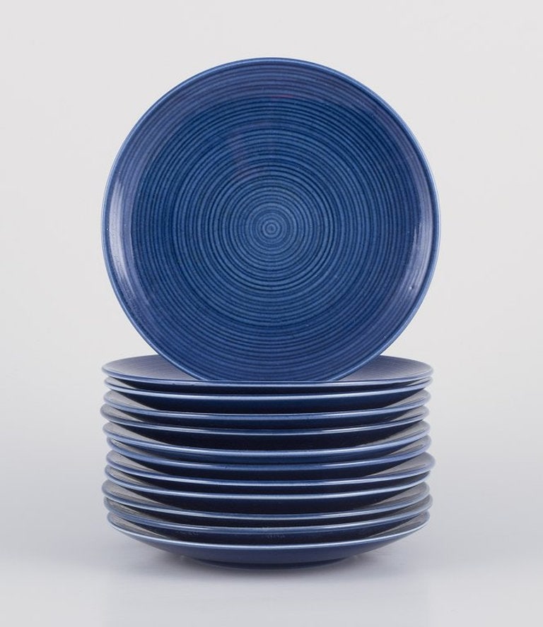 Gertrud Lönegren for Rörstrand, Sweden. Set of twelve 'Blå Blanche' plates in: Title: Gertrud Lönegren for Rörstrand, Sweden. Set of twelve 'Blå Blanche' plates in faience. Circa 1960s. Description: Gertrud Lönegren for Rörstrand, Sweden. Set of twelve