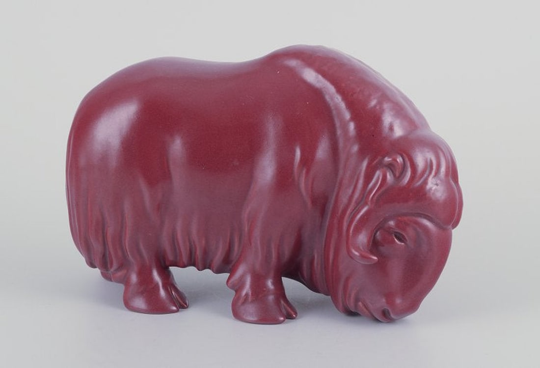 Svend Lindhart, Danish ceramicist, own workshop. Musk ox in ceramic. Ca. 1960.: Title: Svend Lindhart, Danish ceramicist, own workshop. Musk ox in ceramic. Ca. 1960. Description: Svend Lindhart (1898-1989), own workshop. Danish ceramicist. Musk ox in ceramic. Oxblood glaze.