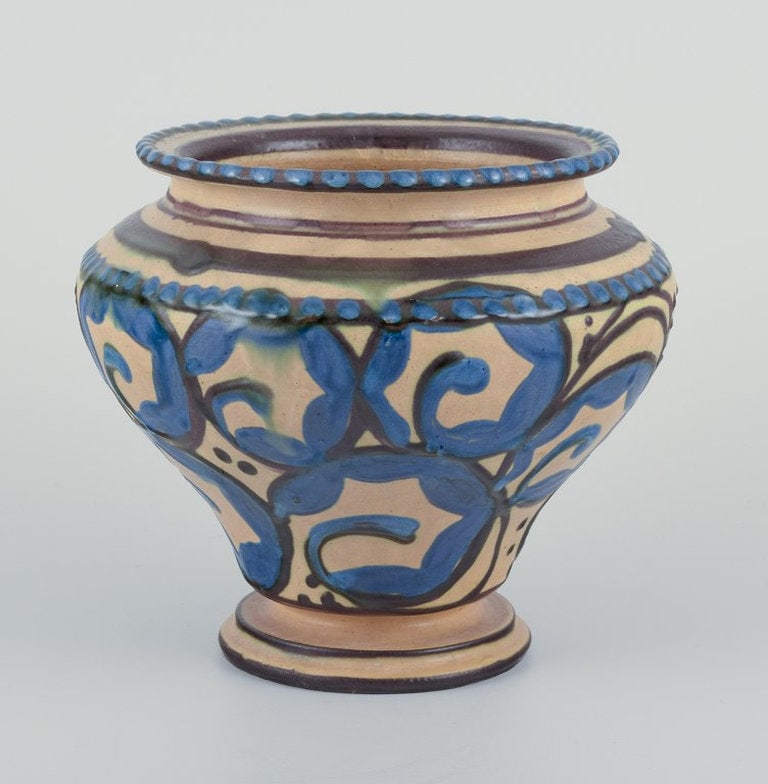 Kähler, Denmark. Ceramic vase in cow horn technique. Circa 1930s.: Title: Kähler, Denmark. Ceramic vase in cow horn technique. Circa 1930s. Description: Kähler, Denmark. Ceramic vase in cow horn technique. Glaze in shades of blue on a cream-coloured base. H