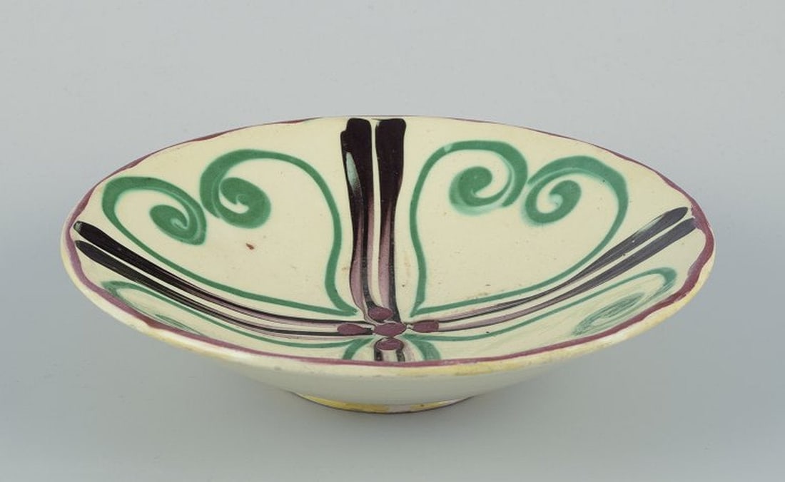 Kähler, Denmark. Ceramic bowl. Cow horn technique on cream coloured base. Circa 1930s. (1 of 8)