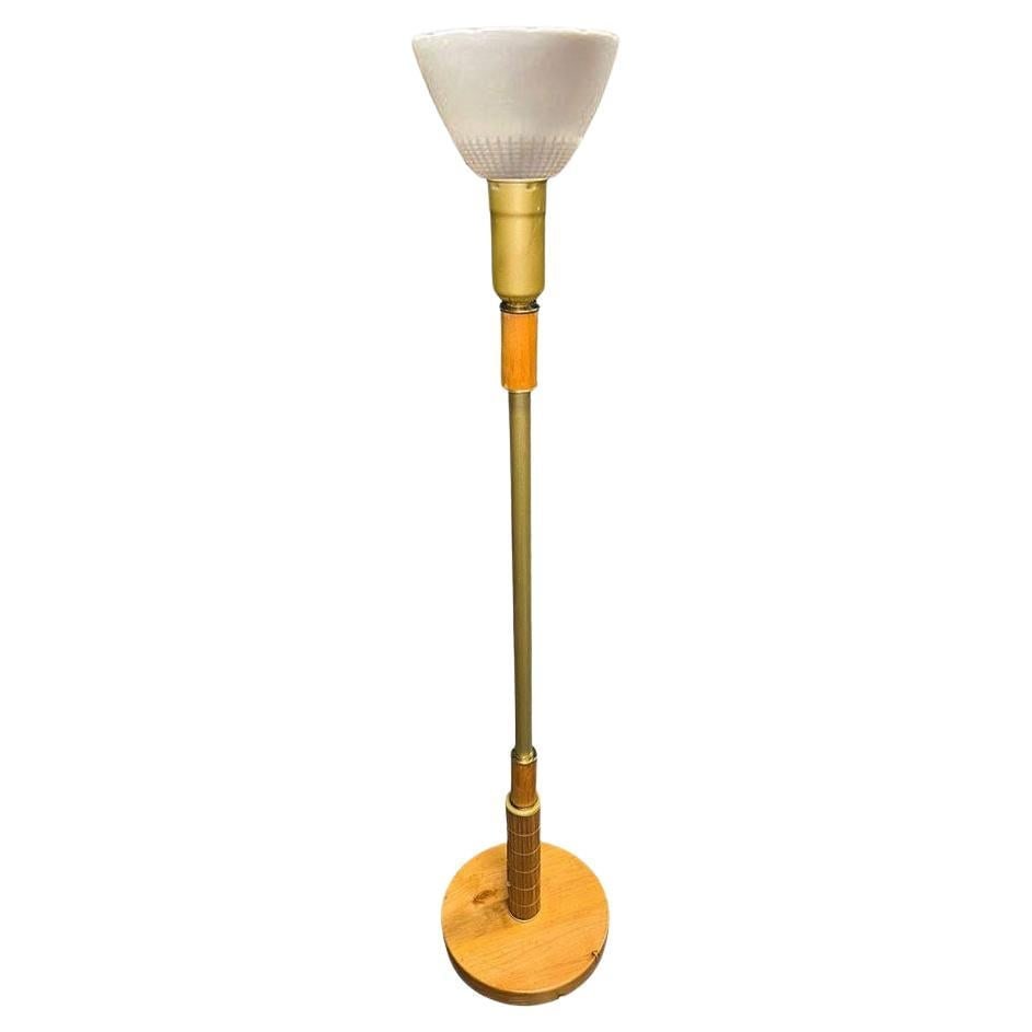 Mid-century Rattan & Brass Floor Lamp w/ Reed Accents: Title: Mid-century Rattan & Brass Floor Lamp w/ Reed Accents Description: Mid-century rattan pole lamp featuring a single brass pole centered with a bottom section wrapped in brass and stick reed