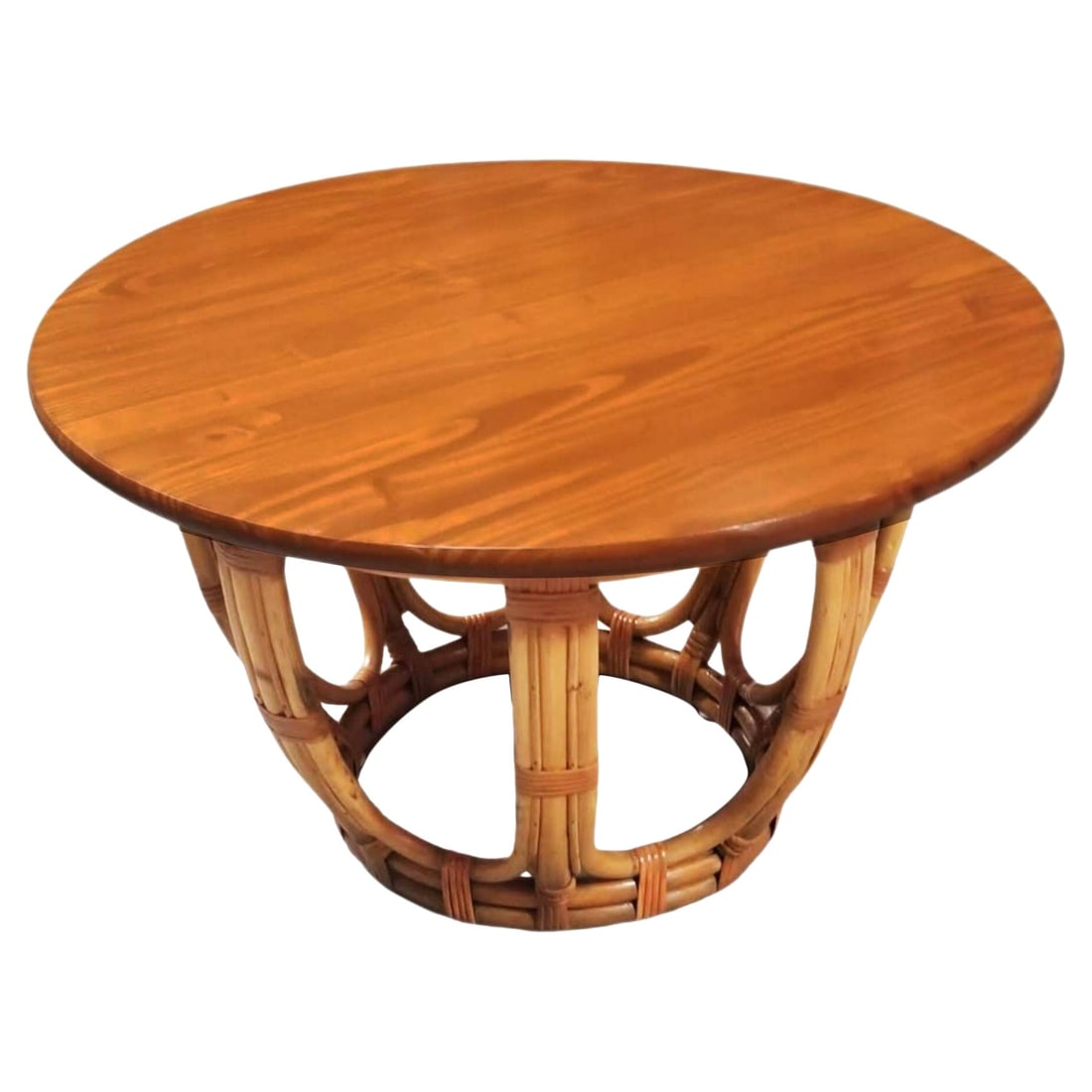Restored Mid-century Rattan & Mahogany 3-Strand Round Drum Base Coffee Table: Title: Restored Mid-century Rattan & Mahogany 3-Strand Round Drum Base Coffee Table Description: This beautifully restored Paul Frankl style rattan and round mahogany coffee table with a drum-shaped