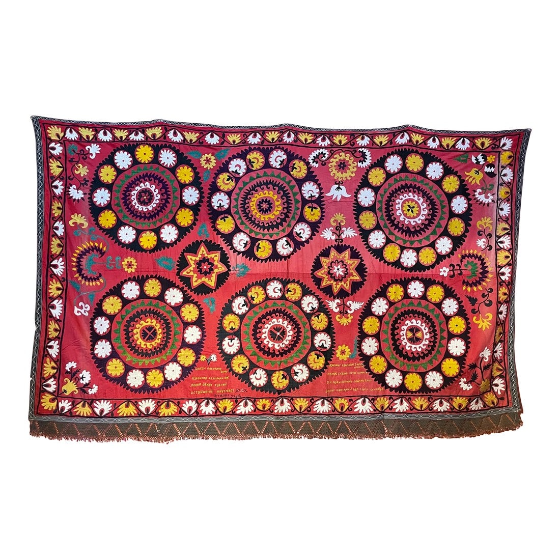 Gorgeous Suzani Textile: This stunning suzani textile is simply mesmerizing. I put it on the back wall of my shop and it just calls right out to you from the front door. This is the only suzani I ahve ever seen that has such 