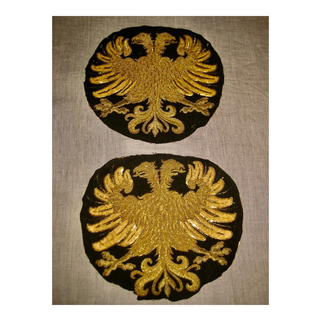 18th Century Coat of Arm Embroidery of Double Headed Eagles- a Pair: Stunning pair of embroideries en gold metallic on felt , representing a double headed eagle that is commonly used for the star of Russia or the Austro -Hungarian Empire , note the very sophisticated