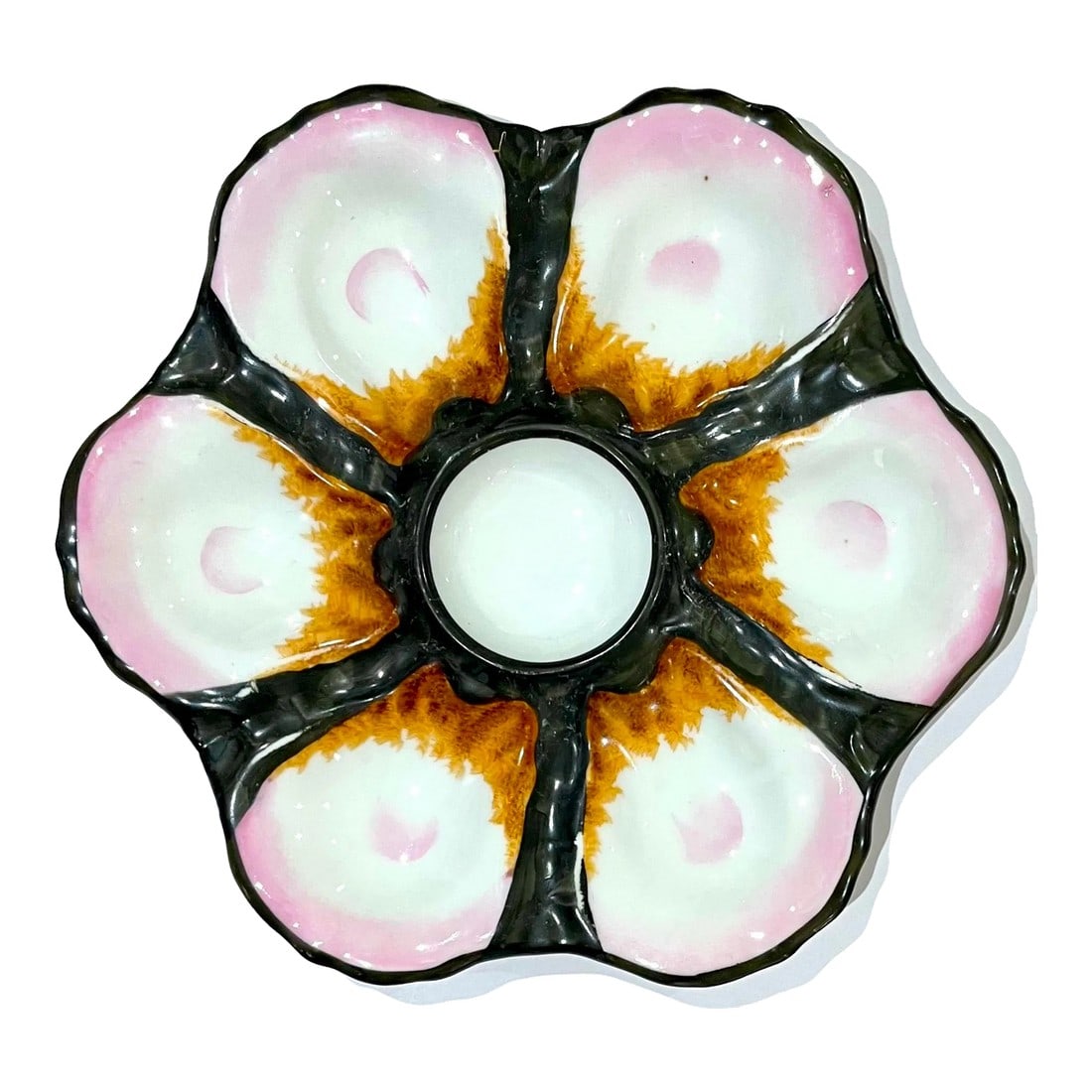 French Hand-Painted Porcelain Oyster Plate - Early 20th Century: Lovely antique French porcelain oyster plate with hand-painted black ground, brown "seaweed" , and pink shells. Features scalloped edge, six oyster wells, and circular sauce depression at center.