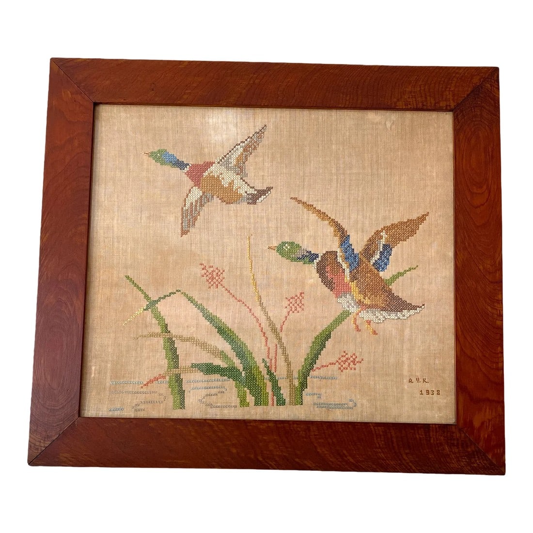 Large Framed 1930s Needlepoint Cross Stitch Mallards in Flight on Linen in Hand Made Oak Frame: Exceptionally handsome piece of early 20th century American folk art. This needlework on linen depicts two mallards taking flight over a pond accented with cattails. Initialed by the stitcher and