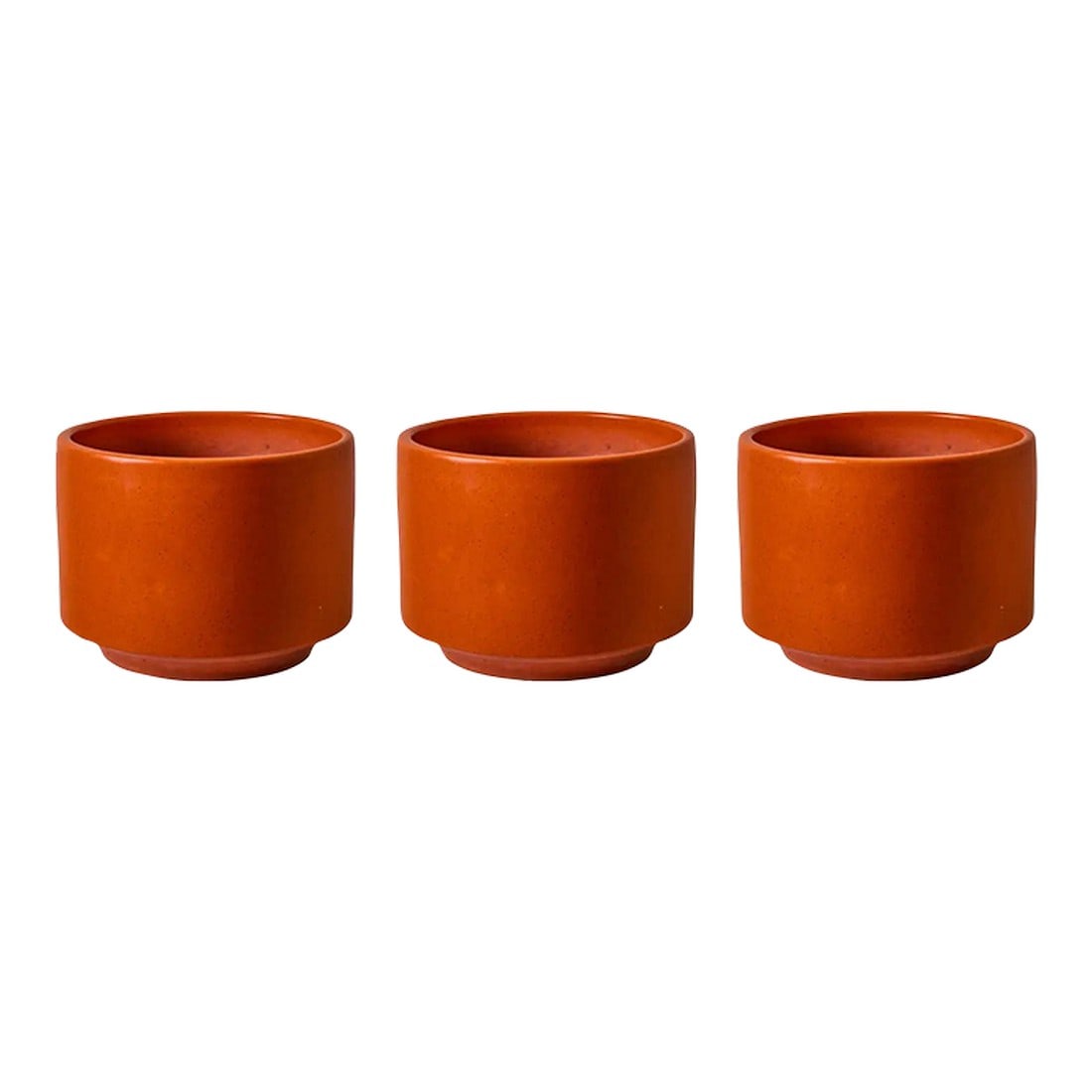 1960s Gainey Orange Glazed Planters - Set of 3: Executed in matte orange glazed ceramic. A very clean and increasingly rare example attributed to iconic ceramics manufacturer Gainey Ceramics, circa 1960s. Drilled, structurally sound and highly