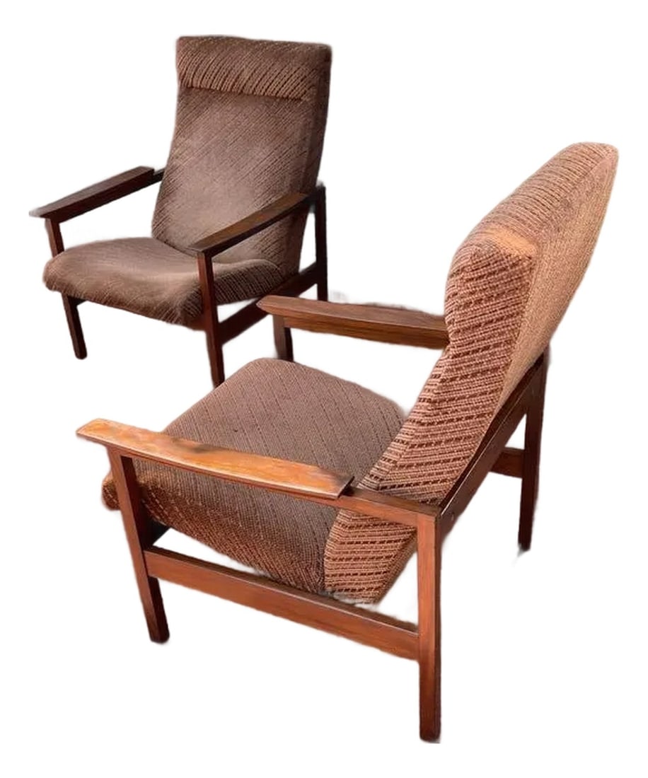 1950s Mid-Century Modern Teak Lounge Chairs With Original Upholstery - Set of 2: Relax in iconic style with this stunning pair of Mid-Century Modern Teak Lounge Chairs, featuring their original upholstery. These chairs are a testament to the enduring design and craftsmanship of