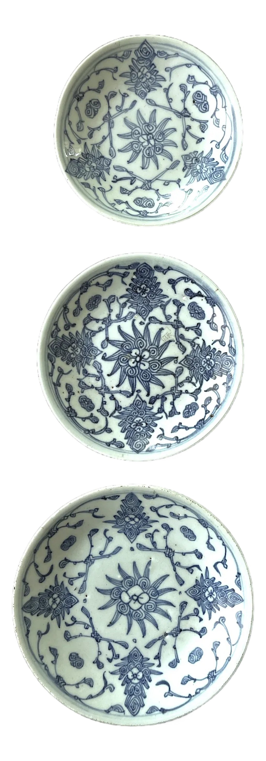 19th Century Daoguang Era Chinese Blue & White Floral Porcelain Plates - Set of 3: 19th Century Daoguang Era Chinese Blue & White Floral Porcelain Plates. Three sizes; 6", 6.5", and 7.5" diameter. Mid-sized plate retains its red wax import seal on base. Hand made and hand painted; t