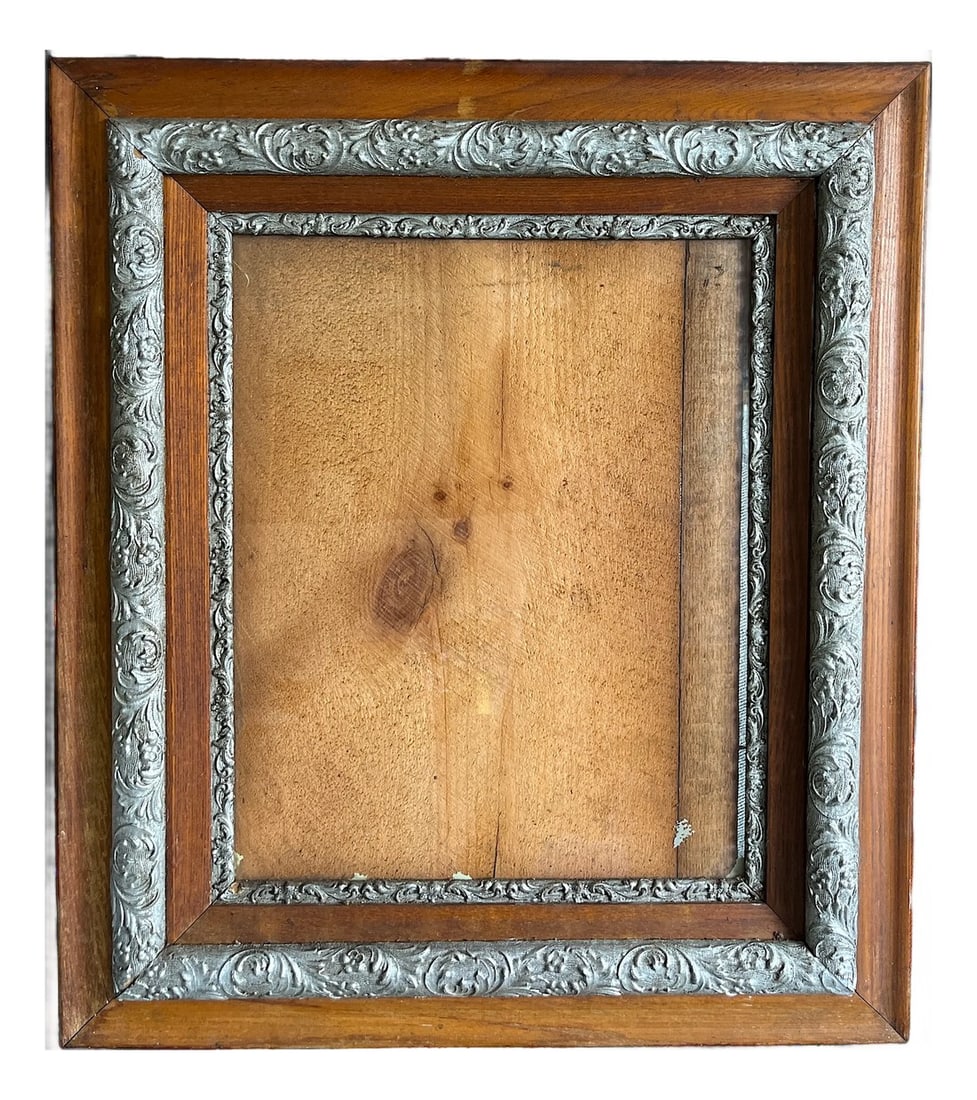 Large 19th Century Antique Wood & Silver Gesso Picture Frame: Richly detailed antique frame featuring a unique blend of warm wood and silver-toned gesso ornamentation. The layered construction includes a flat walnut or oak profile with inset foliate and scrollwo