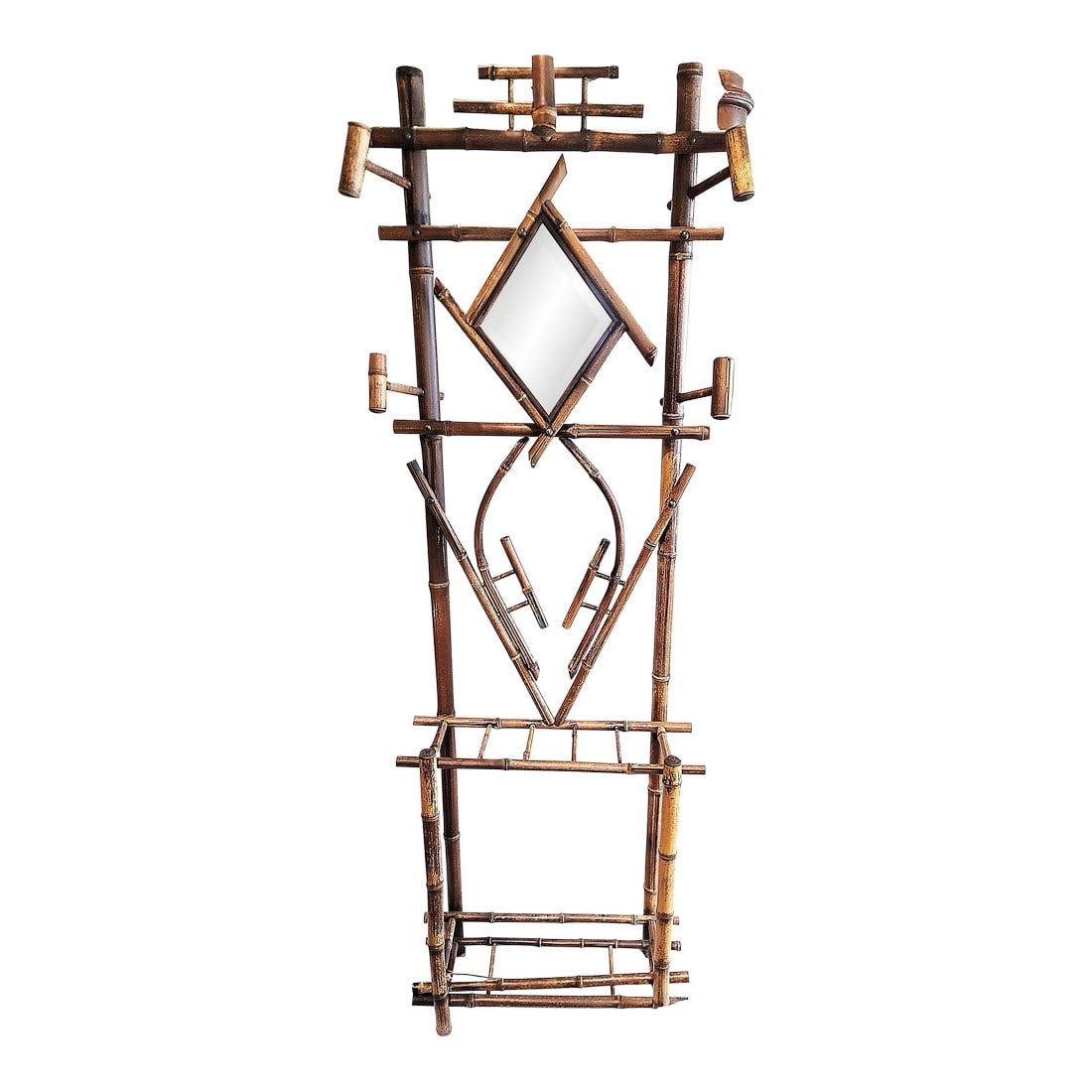 1910s French Burnt Bamboo Portemanteau Vestier Coat Rack: French burnt bamboo hall rack, a 'portemanteau' or vestier with a beveled mirror for that final glance before dashing out the porte. Umbrella stand in the base, a bit of a deco/chinois amalgam in