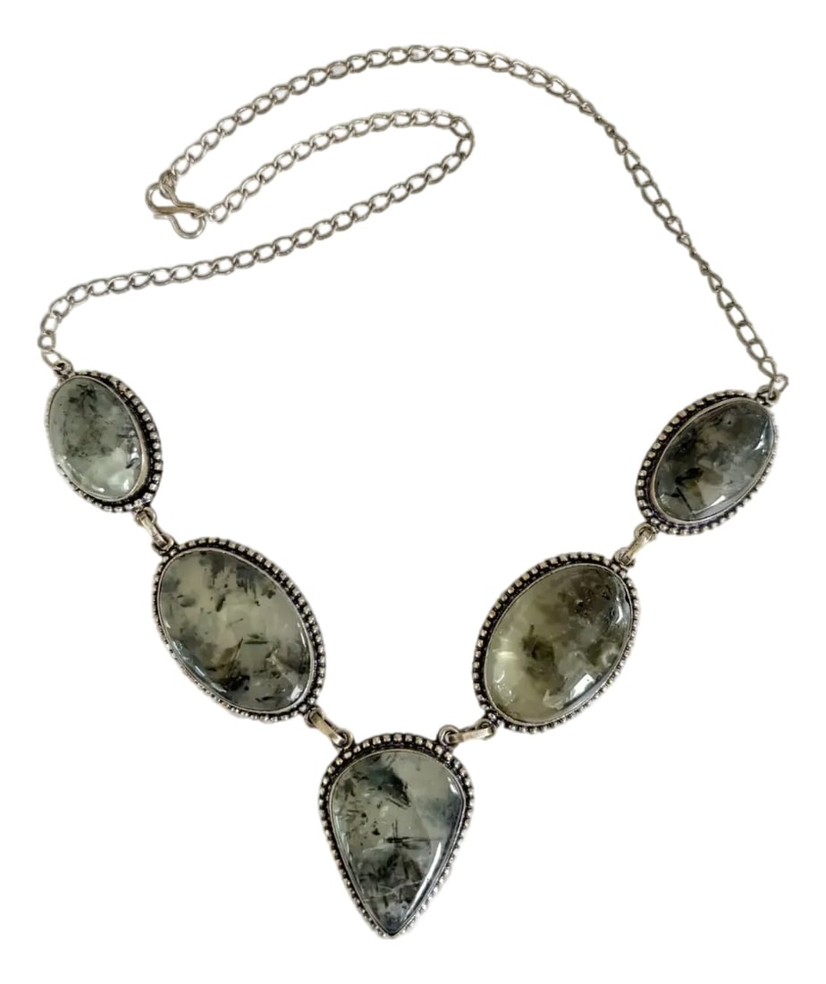 Vintage Prehnite and Sterling Silver Bib Necklace: A wonderfully unique prehnite necklace set in sterling silver. Accented with black. Condition: Alterations: Original Condition Unaltered Imperfections: Some Imperfections Condition Notes: Good