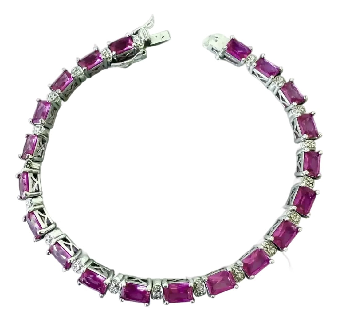 Vivid Pink Tourmaline Sterling Silver Tennis Bracelet With Box Clasp: Lovely pink tourmaline and sterling silver tennis bracelet. Condition: Alterations: Original Condition Unaltered Imperfections: Some Imperfections Condition Notes: Good condition Category: Tennis