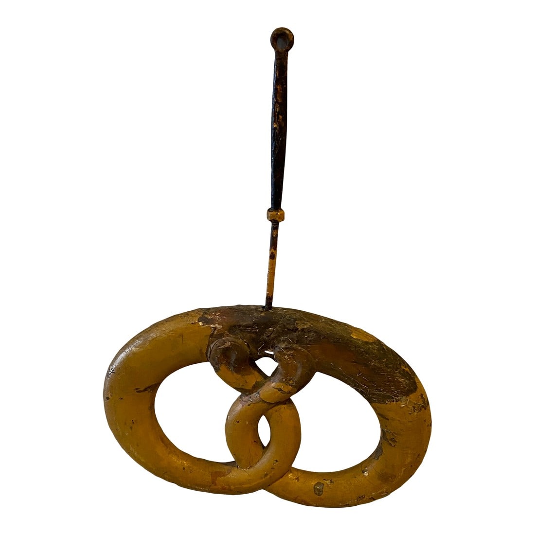 20th Century American Exterior Bakery Carved Wooden Pretzel Trade Sign: Rare 20th century wooden bakery trade sign yellow paint carved pretzel with wrought iron hook and post. Condition: Alterations: Unknown Imperfections: Some Imperfections Condition Notes: Great